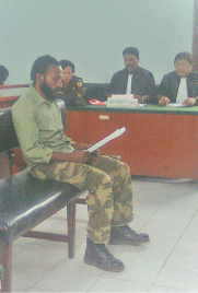 Terdakwa Vicktor Yeimo saat mengikuti Persidangan